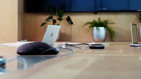 team of business executives applauding in conference room