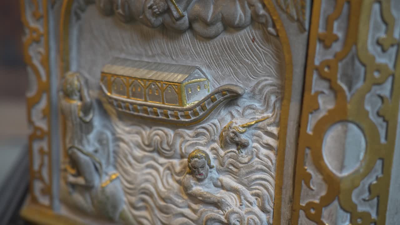 the biblical flood and Noah's Ark depicted on a stone Romania carving