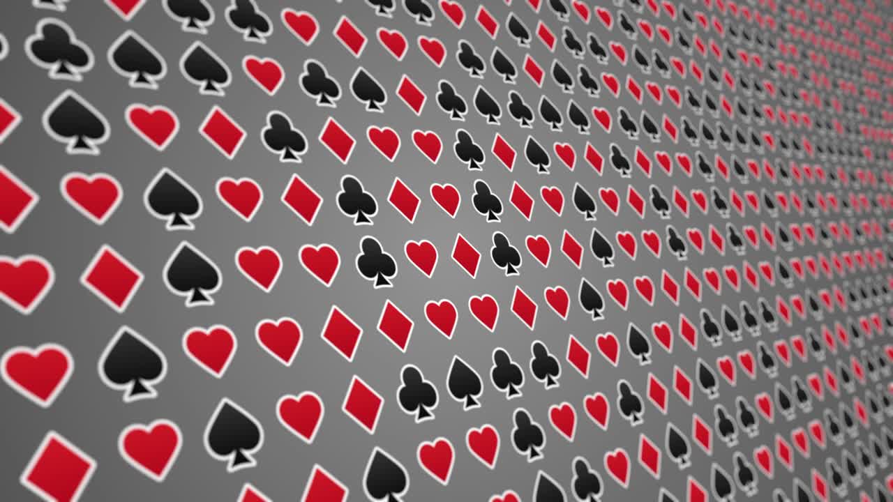 Playing card suits hearts diamonds clubs spades pattern close up