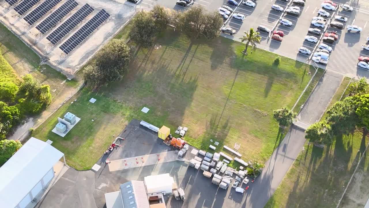 Solar panels and cars in a scenic setting