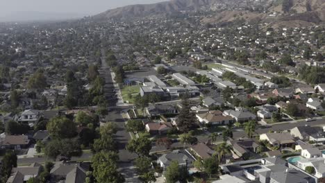 burbank city neighborhood on california mountainside, aerial view