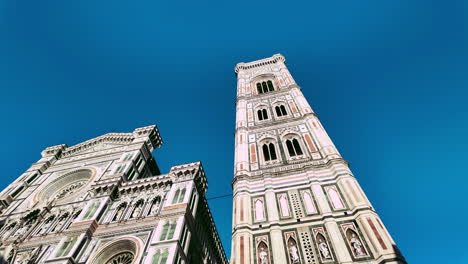 fantastic camera movement on the spectacular facade of the florence cathedral and its towers