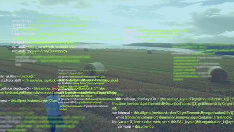 computer code animation over aerial view of agricultural fields