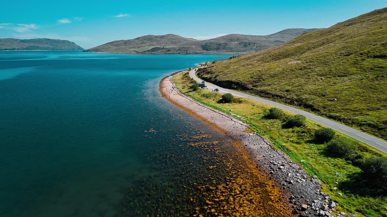 Coastal road along a mountain range