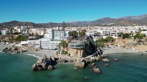 nerja balcon de europa, coastal village and beaches in malaga, costa del sol, andalusia, spain - aerial 4k circling