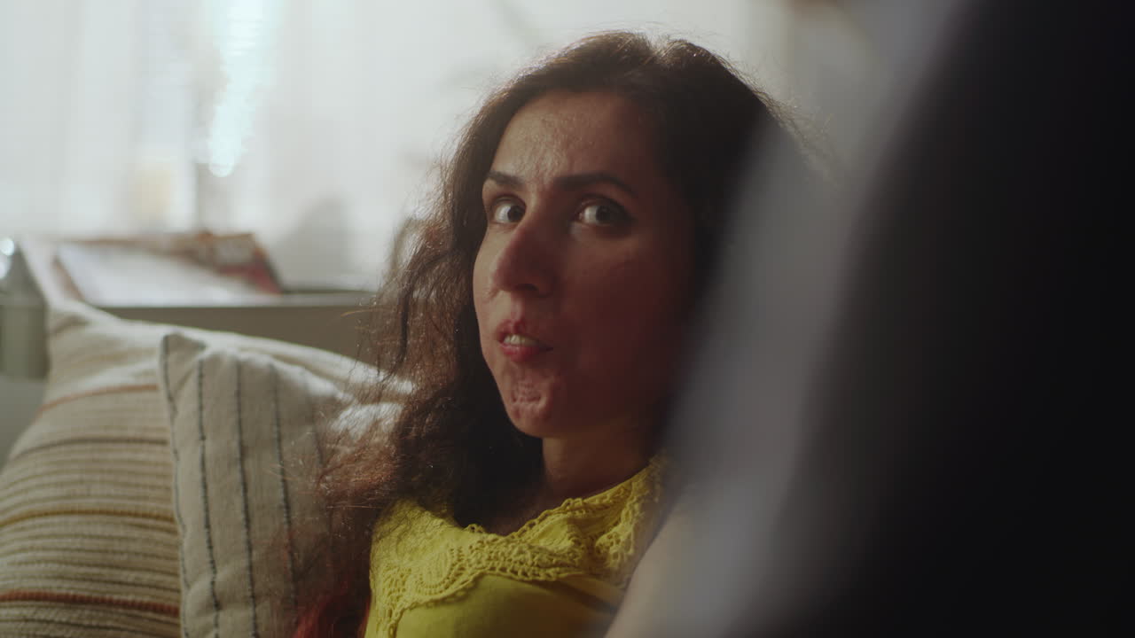 Woman Eating and Talking