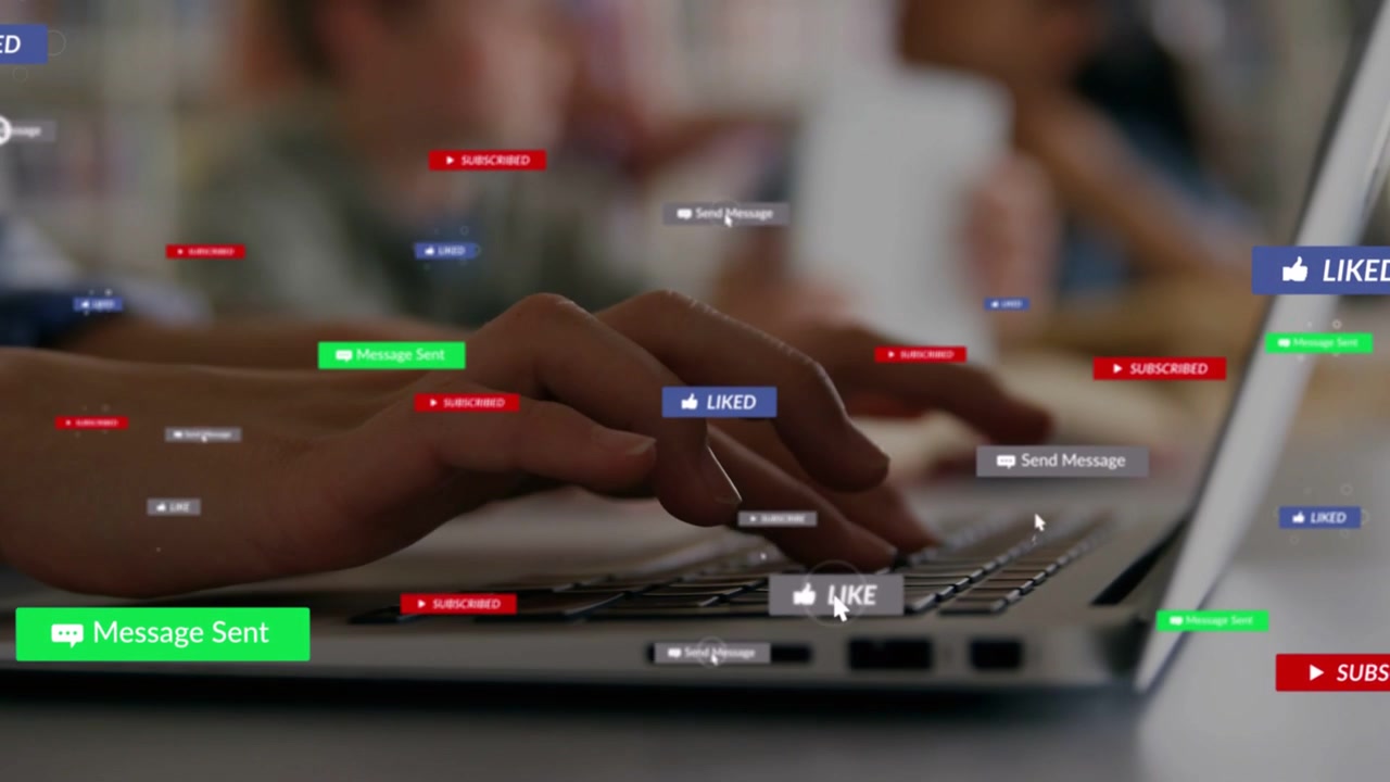 Hands typing on laptop in study making floating LIKE and msg badges around hands showing engagement