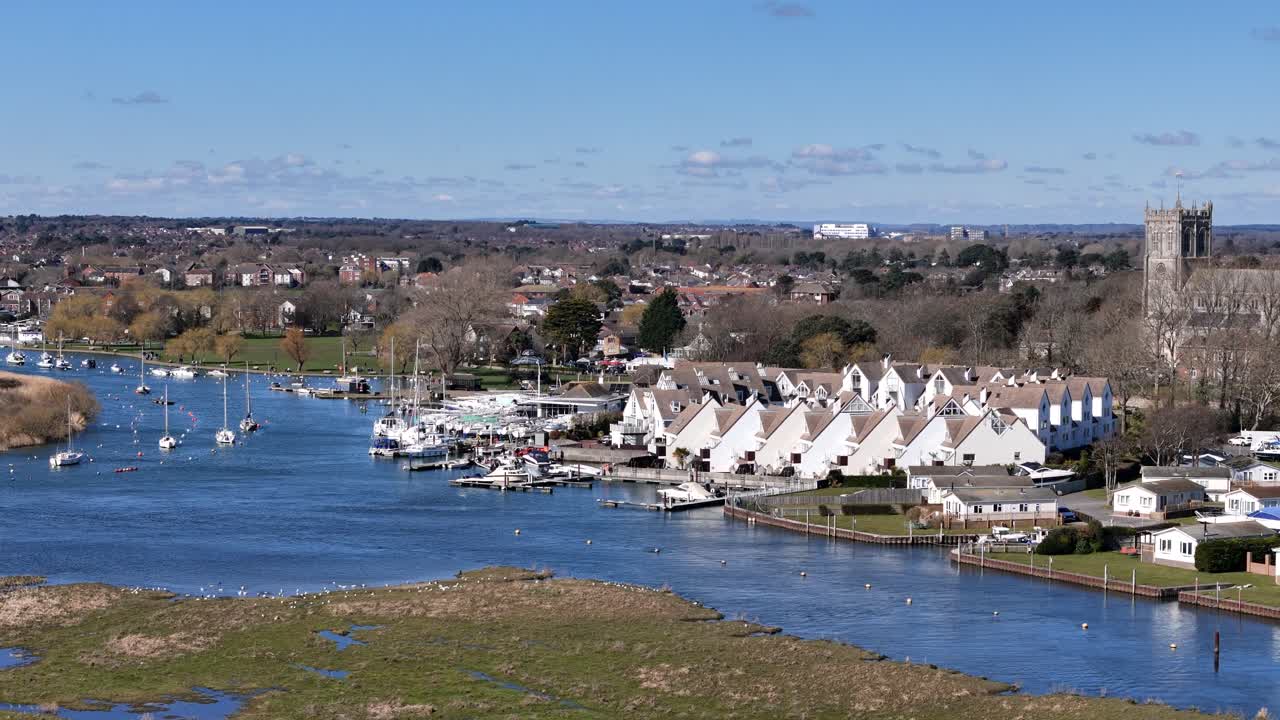 Panning drone aerial Christchurch harbour Dorset UK