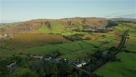 Establishing-Drone-Shot-of-Helwith-Bridge-and-Active-Quarry-at-Golden-Hour