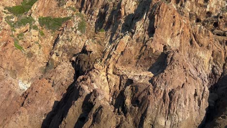 scandola unesco nature reserve tour boat in summer season, corsica island in france