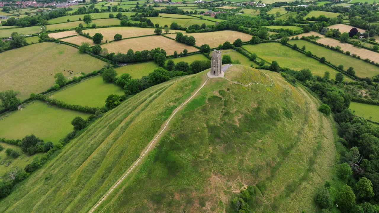 Above View Of The 15th-century Tower. Glastonbury Tor In Somerset, England. Aerial Drone Shot