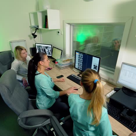 doctors looking at results of patient