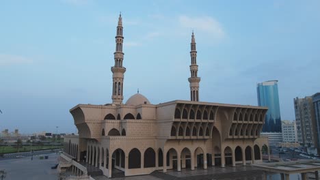 4k:-Drone-view-of-King-Faisal-Mosque-in-the-central-part-of-Sharjah,-United-Arab-Emirates