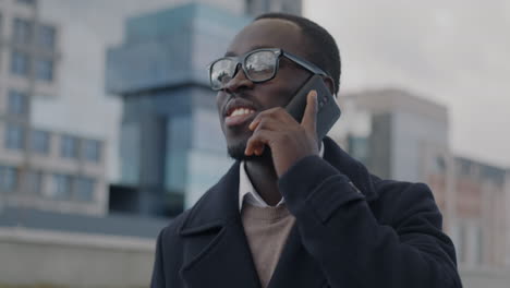 man on phone in city