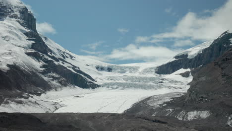 stunning view of the athabasca glacier nestled in the canadian rockies along the icefields parkway