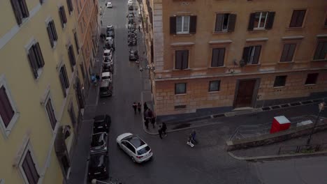 aerial view on the roofs of rome in the neighborhood of the spanish steps. tilt down motion.