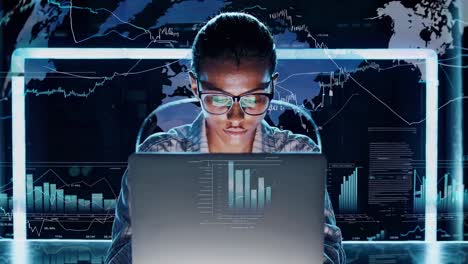 aerial view of a person at a laptop with digital graphs overlay, creating a futuristic video concept