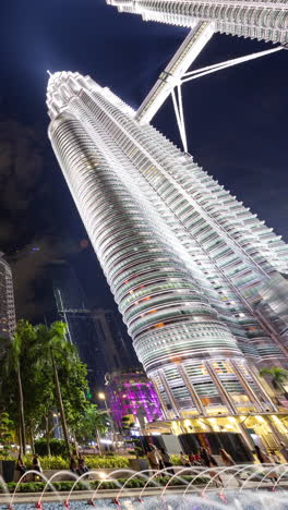 kuala lumpur petronas towers and skyline in vertical