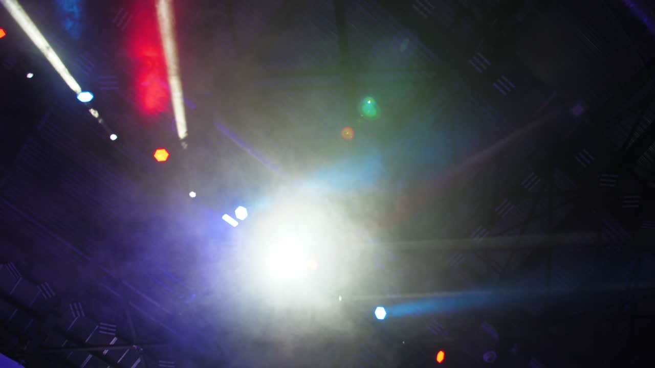 Multicolored spotlight of scene lights in the dark