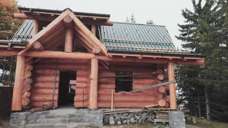 outer part of wall with protruding logs of wooden country house