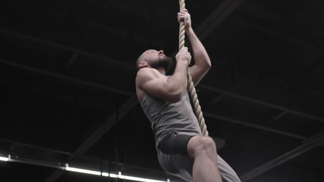 Sportsman Climbing a Tightrope