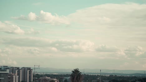 amazing time lapse above the city, was shot from the roof, israel tel aviv, middle east, colorful surfing clouds, golden hour, cityscape, sony 4k video