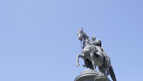 equestrian statue against a clear blue sky