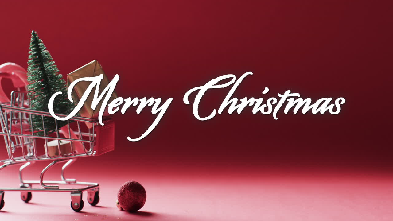 Merry christmas text in white over christmas tree and gifts in shopping cart on red background