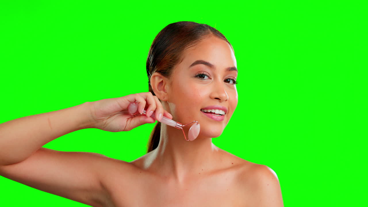 Skincare, roller and face of woman on green screen
