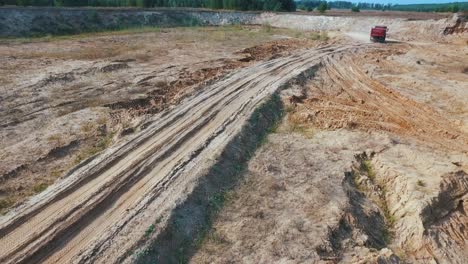 aerial view of a quarry with a truck