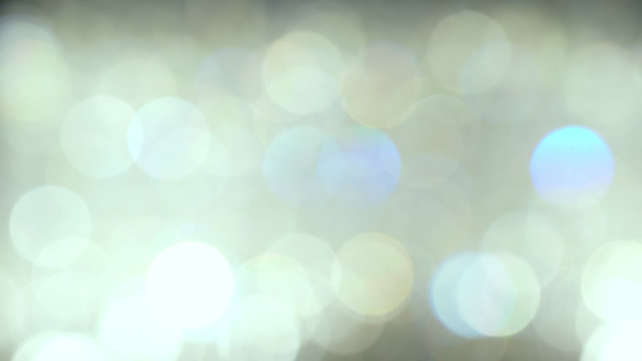 Abstract bokeh lights with soft light background, Bokeh blurred of Chrystal chandelier.
