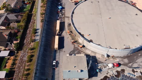 Santa-Cruz-city-crew-spraying-high-velocity-concrete-on-a-storm-damaged-water-tank---aerial