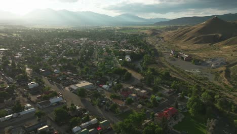 Aerial-cinematic-drone-sunset-golden-hour-summer-downtown-Salida-Lime-Mill-Colorado-near-Buena-Vista-Arkansas-River-Riverside-Park-Scout-surfing-wave-biking-hiking-rafting-Rocky-Mountain-forward