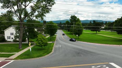 Landing-on-the-sidewalk-of-a-street-in-new-England