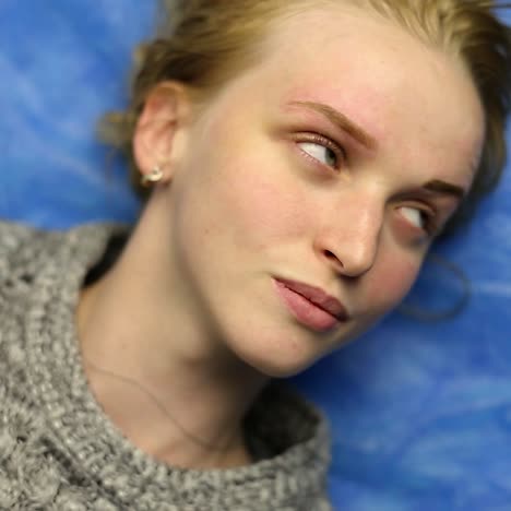 woman in process of eyebrow tattoo