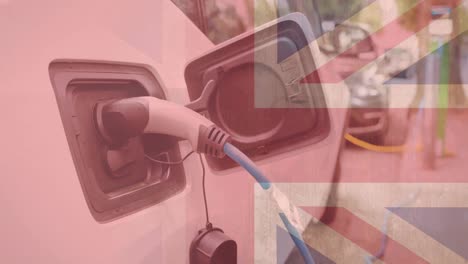 Bandera-De-Gran-Bretaña-Sobre-La-Carga-De-Un-Coche-Eléctrico-En-La-Estación-De-Carga-De-Vehículos-Eléctricos