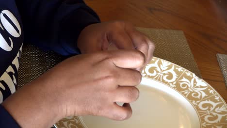 african american hands only preparing marijuana to smoke