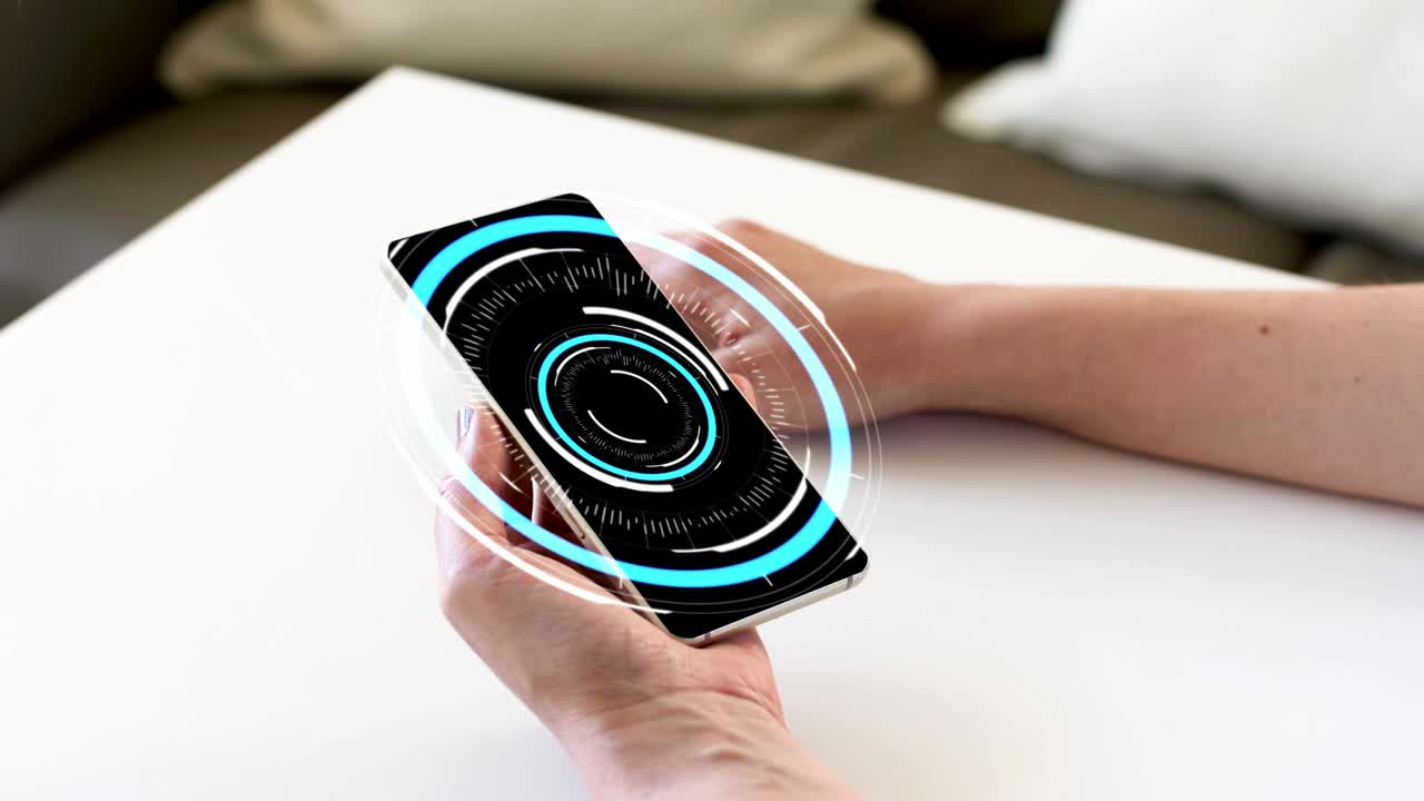 hands holding smartphone with virtual hologram
