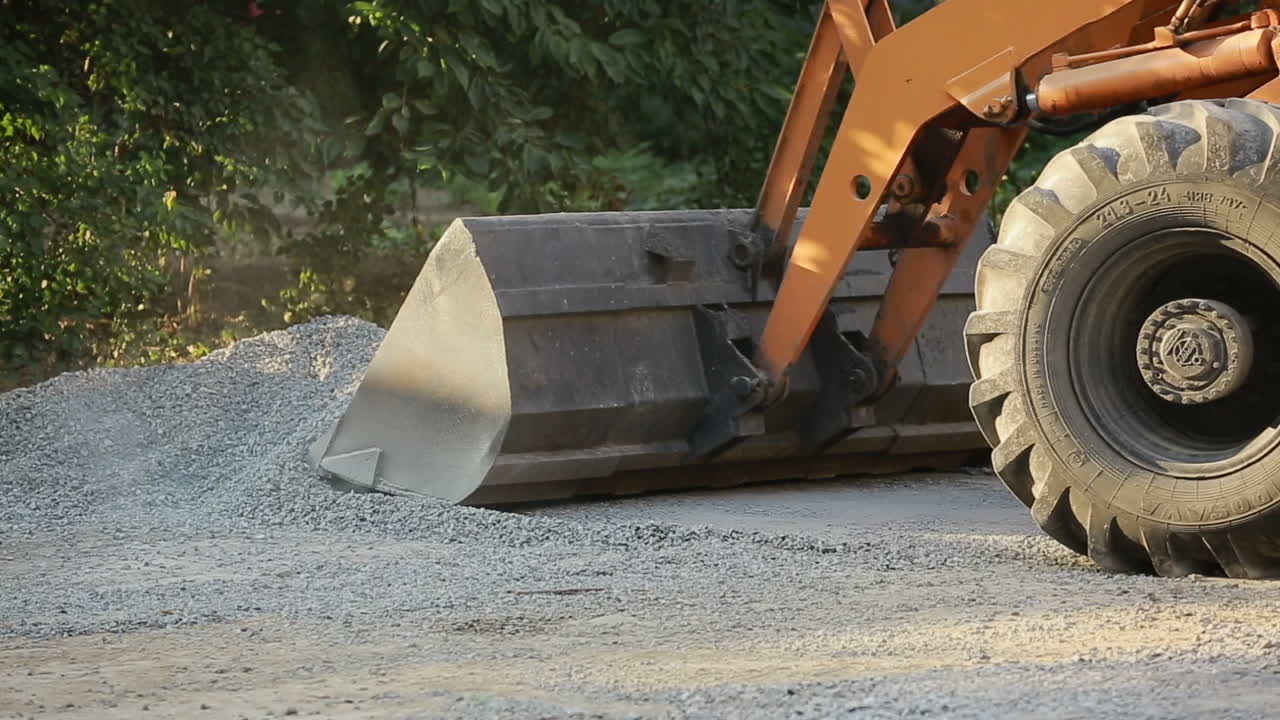 Construction workers during asphalting road works