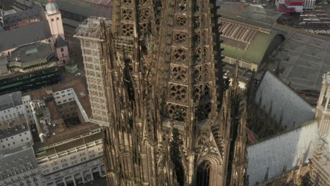 Cinematic-shot-of-Cologne-Cathedral-towers.-Aerial-view-of-amazing-historic-tall-structure.-Cologne,-Germany