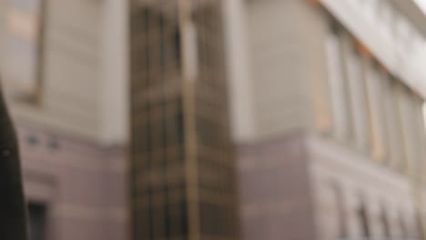 Close-up-view-of-African-American-businessman-and-caucasian-businesswoman-shaking-hands-in-the-street-in-autumn