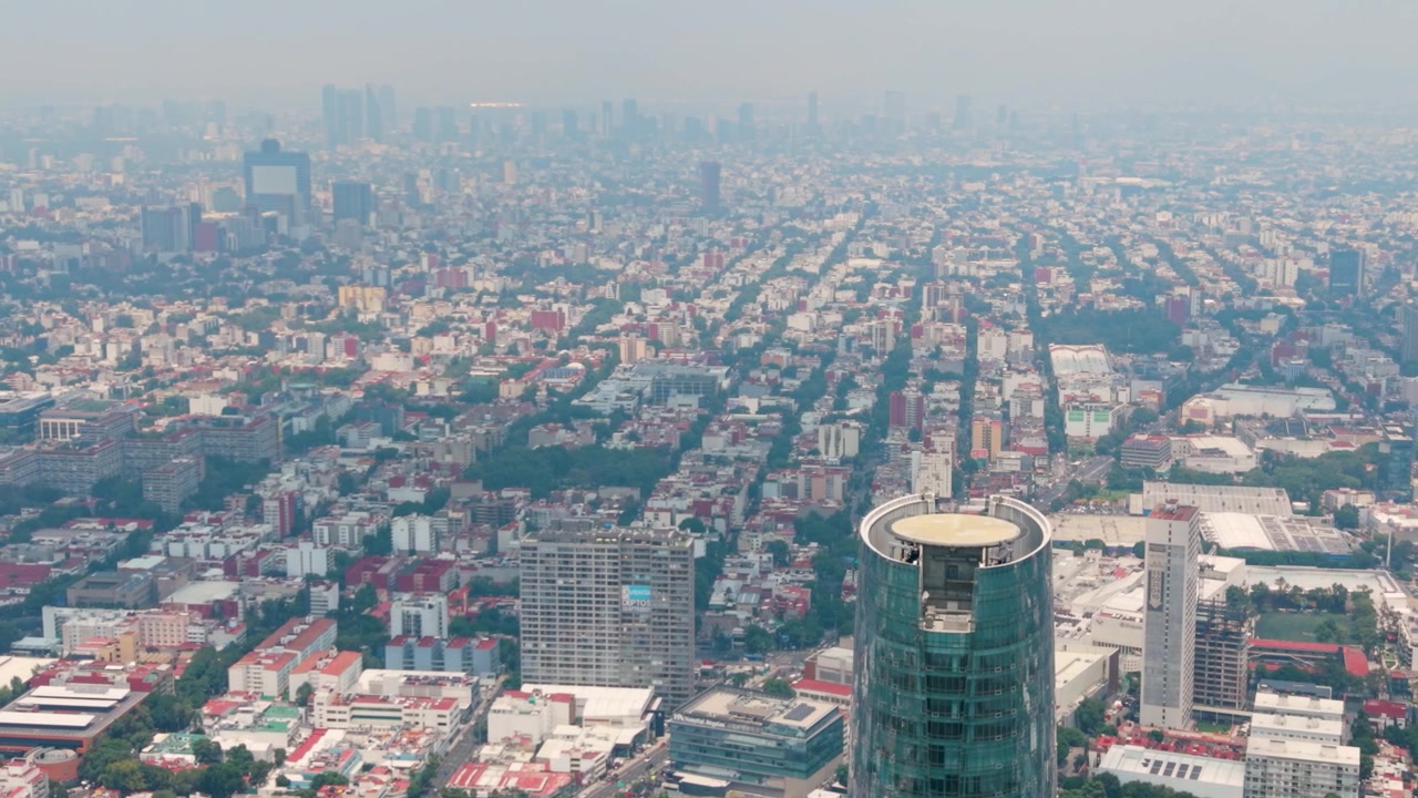 Wide drone panorama of Mexico City featuring Mítikah Tower
