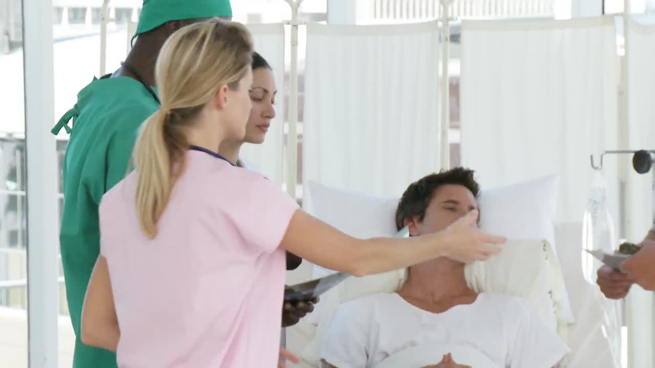 환자 와 함께 있는 병원 팀