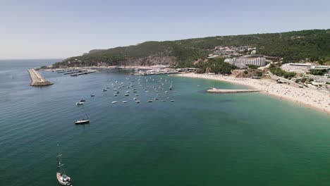 sesimbra port full of luxury vip yachts seen from the air, portugal