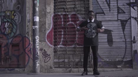 stylish man posing in an urban street scene
