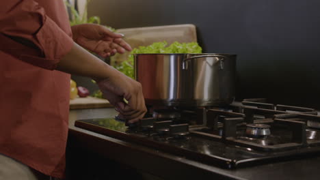 person cooking in the kitchen