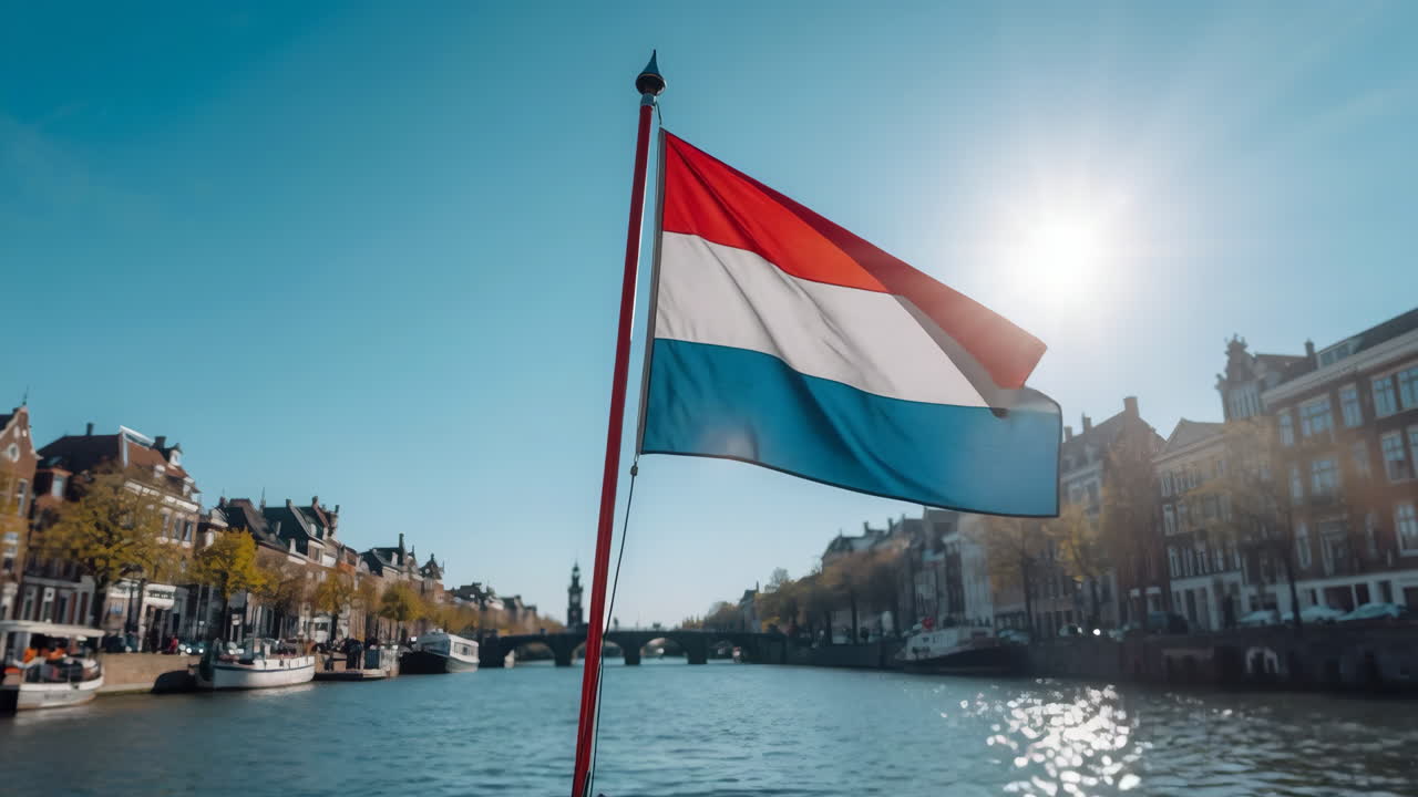 Amsterdam Canal with Dutch Flag