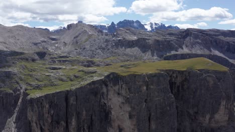 aerial moving towards sella group mountain group in puez odle national park