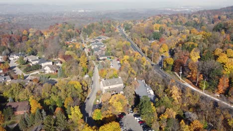 Aerial-view-of-Niagara-Glen-parkway-running-through-scenic-woods-in-fall-colors