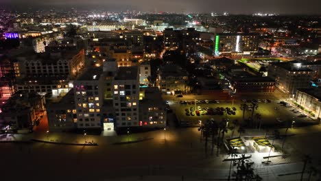 santa monica beach front buildings, hotels and houses and night with city glow